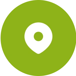 Here's an alt tag for the image: `Green location pin icon`