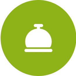 Here's a short alt tag for the image: `White bell icon on green circle`